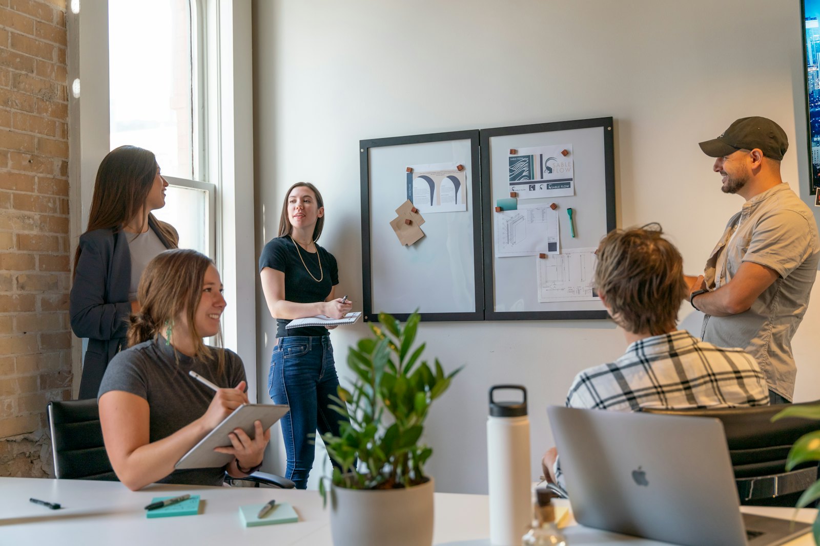 A small team around a whiteboard